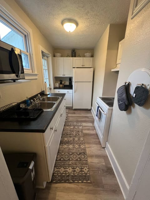 Full kitchen equipped with cooking essentials. 