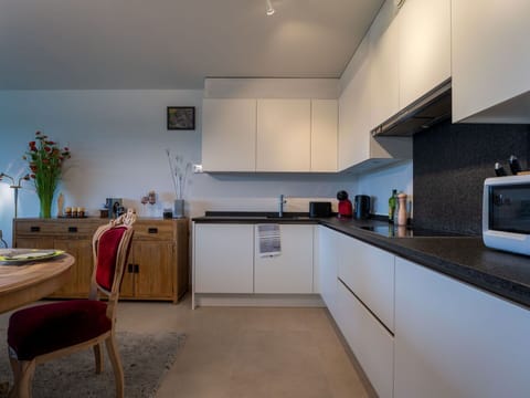 Kitchen, Countertop, Kitchen Appliance, Interior Design, Cabinetry, Furniture, Flooring, Major Appliance, Ceiling, Wood