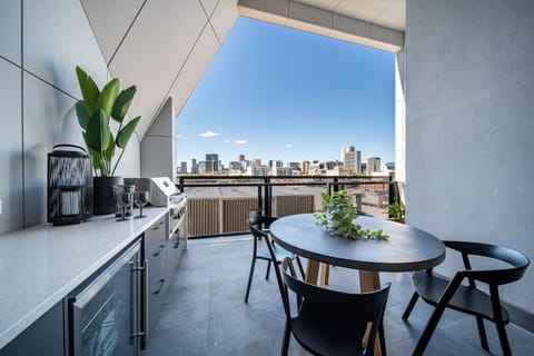 Step out onto the expansive balcony and take in the fresh air and elevated outlook.