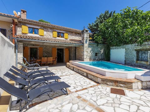 Swimming Pool, Composite Material, Outdoor Furniture, Tile, Flagstone, Resort, Chair, Shade, Cobblestone, Courtyard