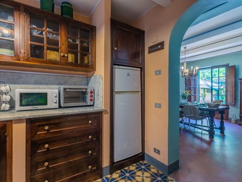 Interior Design, Wood, Flooring, Furniture, Floor, Cabinetry, Ceiling, Lighting, Room, Kitchen