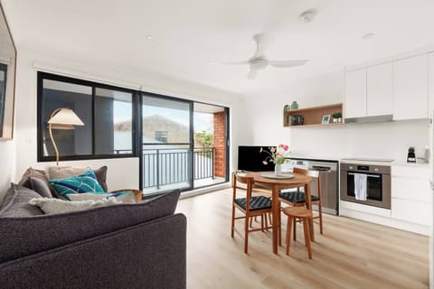 Start your mornings bathed in natural light, lounging in the relaxed, open-plan living area.