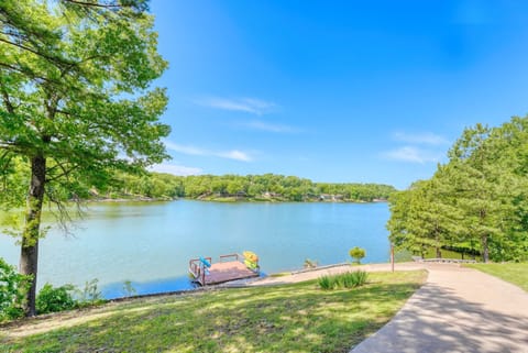 Stunning lakefront view from the lawn with our private dock—perfect spot for sunrise coffee or sunset wine.