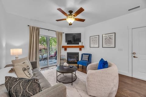 Living room: Main floor, gas fireplace, Smart TV, open layout near kitchen