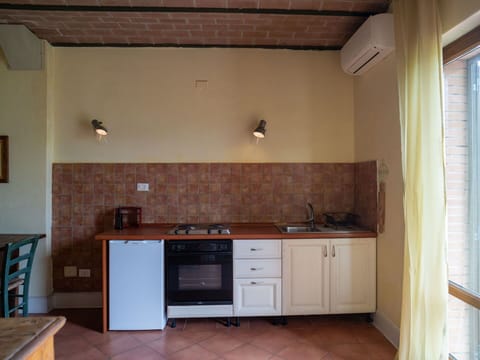 Flooring, Interior Design, Kitchen, Wood, Floor, Furniture, Countertop, Kitchen Appliance, Major Appliance, Ceiling