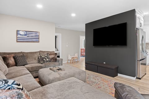 Sink into the sectional and enjoy movie night on the big screen TV