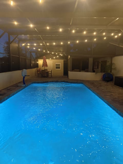 Pool enclosure lights and LED in pool light  for night swimming experience.