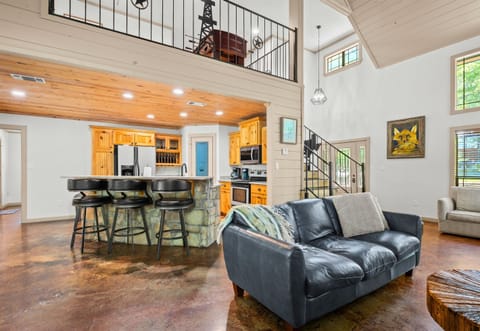 From breakfast at the bar to evenings by the fire, this open floor plan keeps everyone connected.