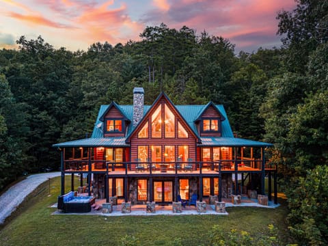 Exterior Escape: Marvel at breathtaking sunsets from the spacious outdoor deck, perfect for gatherings!