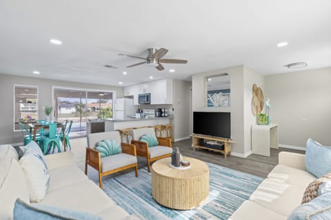 Living room in an open floor concept wit the dining and kitchen