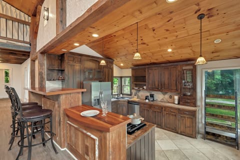 High-end custom kitchen with stainless steel appliances and great views.