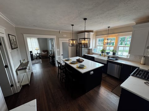 The kitchen provides a wonderful flow for your guests.