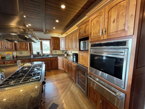 Gourmet kitchen. 2 ovens, 6 burners, 3 dish washers, wine refrig, ice machine, +