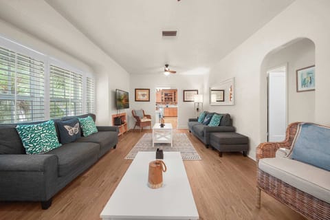 Relax in this inviting living room with cozy seating, natural light, and stylish decor—perfect for unwinding after a day of adventure.