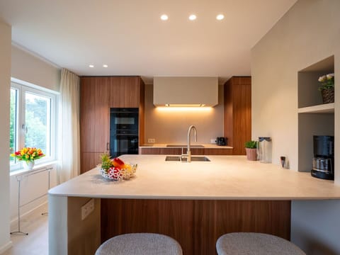 Interior Design, Countertop, Furniture, Kitchen, Flooring, Cabinetry, Wall, Kitchen Appliance, Wood, Light Fixture