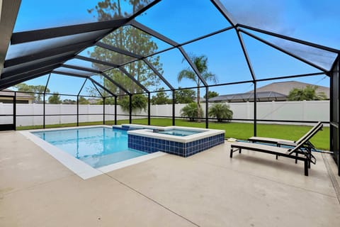 Heated pool, spa and large fenced backyard