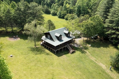 Private, with plenty of lawn space surrounded by woods.
