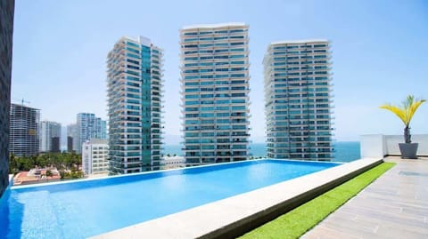 Enjoy the refreshing rooftop swimming pool with great views
