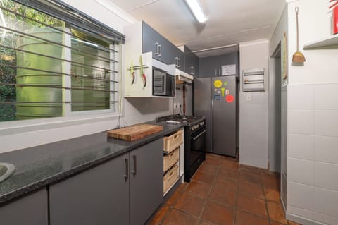 Full kitchen with gas stove, double door fridge and comes fully equipped