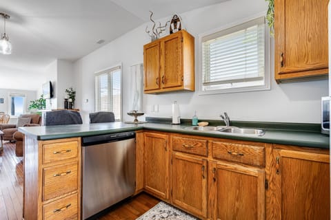 Cook with a view of the calm, sunlit lake