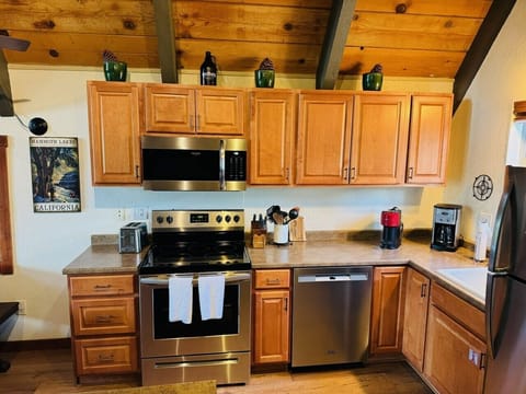 Well stocked kitchen with Nespresso machine