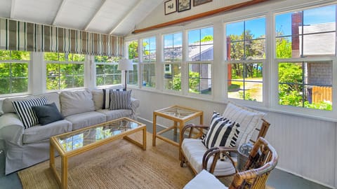 Lovely and bright screen porch with peaks of Wellfleet Harbor