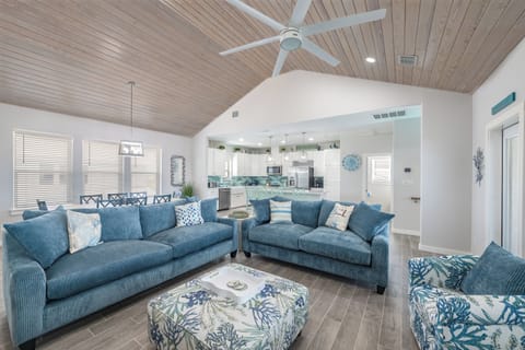 Relax in Style: Open Concept Kitchen, Dining, and Living area with Queen Sleeper Sofa