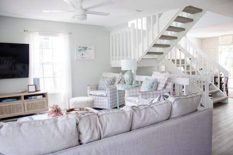 Living room with a view of the stairs