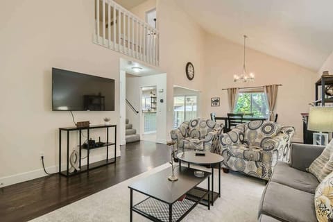 Enjoy a living room bathed in natural light, creating a warm and inviting space for relaxing or entertaining.