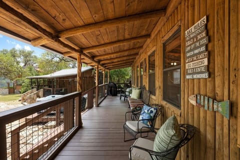 The spacious main deck offers plenty of comfortable seating, a gas grill, and sweeping views of Lake Travis—ideal for BBQs, evening chats, and making memories with family and friends.