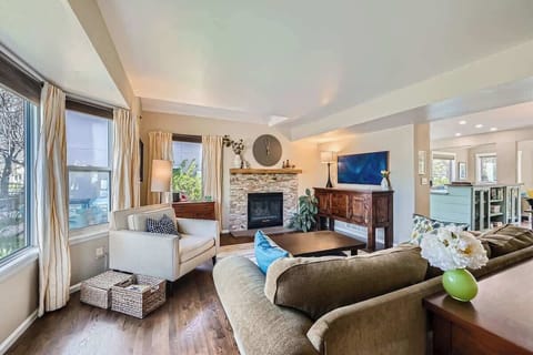 Warm and welcoming seating area with a fireplace, ideal for reading or unwinding