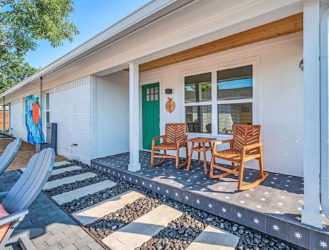 {Breakfast patio} Rockers & table overlook outdoor space