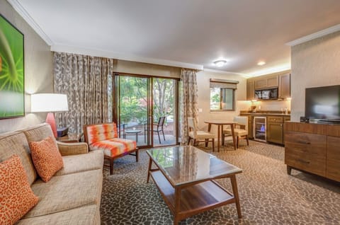 Gather for movies and snacks in this roomy suite living area.