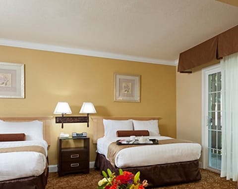 Settle in with two comfy beds and a cozy lounge corner.