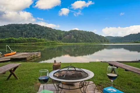 Waterfront fire pit is perfect for enjoying the serene lake views.