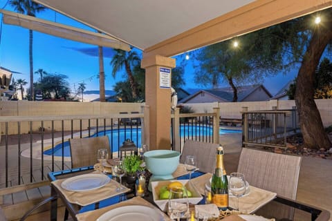 Large private backyard with heated swimming pool