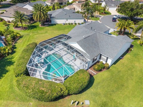 Aerial View of Palm Breeze Oasis with Birdcage