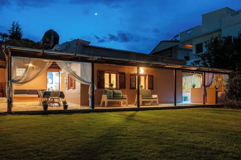 Evening magic under the crescent moon, perfect for unwinding or enjoying a warm summer night outdoors!
