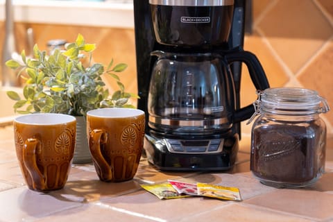 Morning essentials provided: coffee, decaf & tea for every taste.