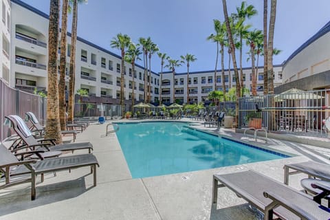 Soak up resort energy with sweeping courtyard pool views.