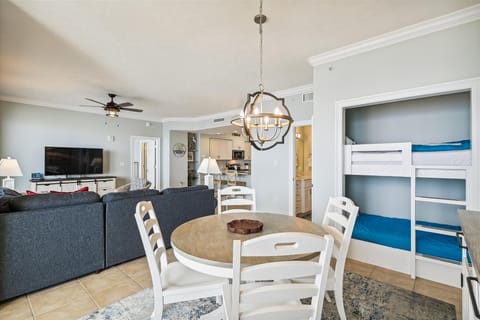 living room dining area and twin/twin bunks