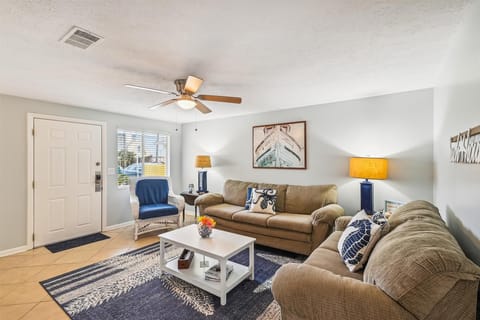 living area with cozy furniture and chair