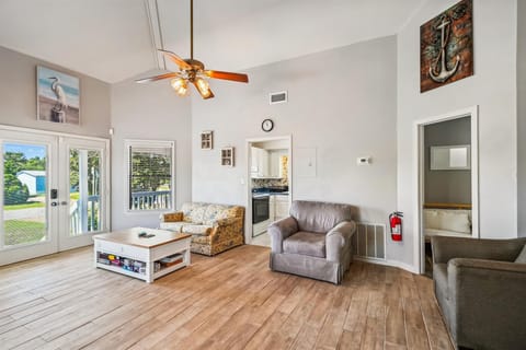 Living room Area leads into kitchen and Second Bedroom with Bunks and futon