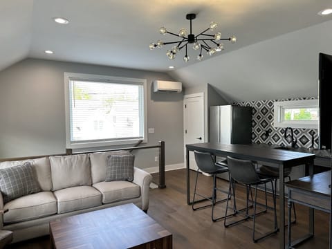 Casita featuring 2 living areas, kitchenette, and a half bathroom