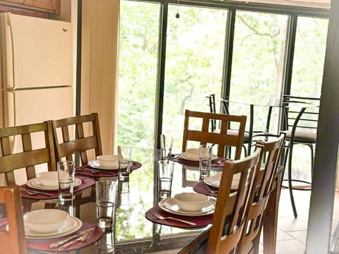 A dining space that brings the outdoors in—bright, peaceful, and perfect for any occasion.