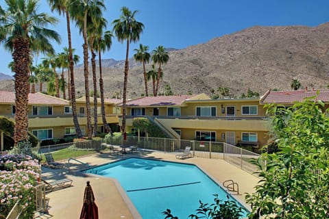 Resort-style community pool with mountain views in South Palm Springs