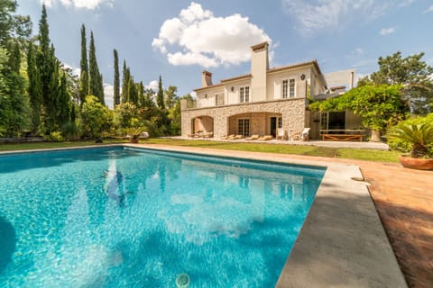 holiday home with pool next to golf course