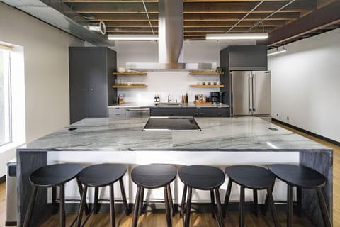 Stylish and functional kitchen with everything you need, from stainless appliances to spacious island seating.