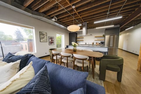 Relax in the spacious living room with curated decor and plenty of room to unwind.