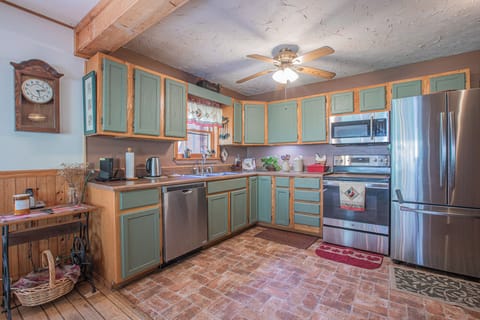 The kitchen equipped with all of your basic cooking needs.